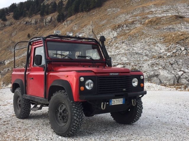 1991 Red Land Rover Defender SUV