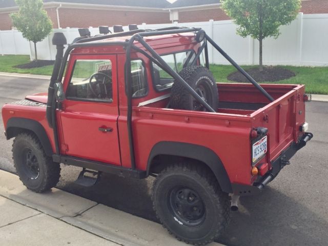 1991 Red Land Rover Defender SUV