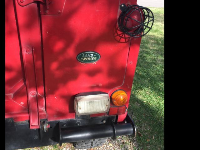 1991 Red Land Rover Defender SUV