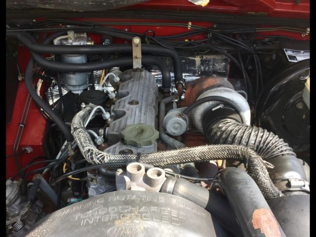 1991 Red Land Rover Defender SUV