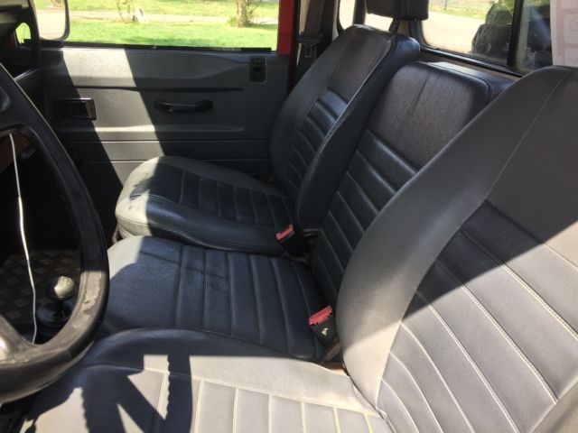 1991 Red Land Rover Defender SUV