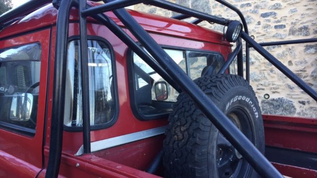 1991 Red Land Rover Defender SUV