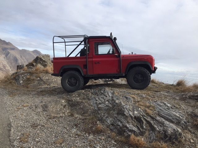 1991 Red Land Rover Defender SUV