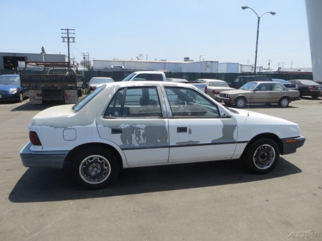 1991 White Dodge Shadow