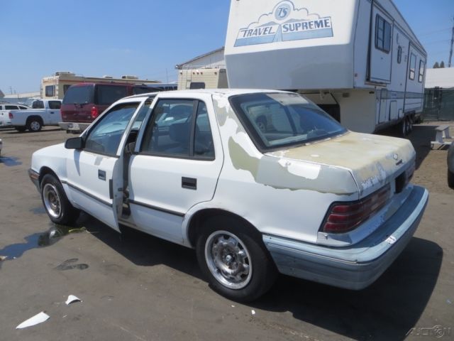 1991 White Dodge Shadow