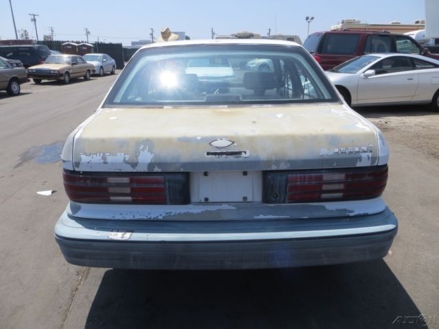 1991 White Dodge Shadow