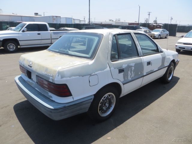1991 White Dodge Shadow