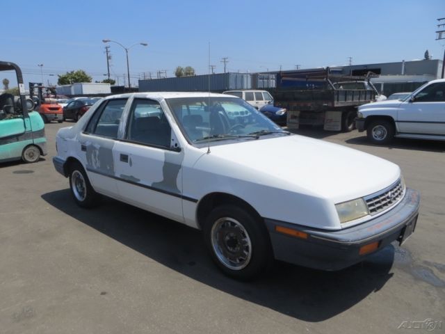 1991 White Dodge Shadow