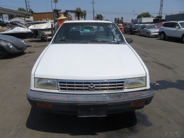1991 White Dodge Shadow