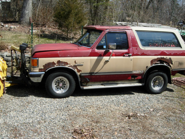 1991 Red/Biege Ford Bronco