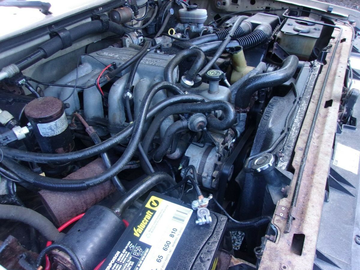 1991 Tan Ford F-150 Standard Cab Pickup