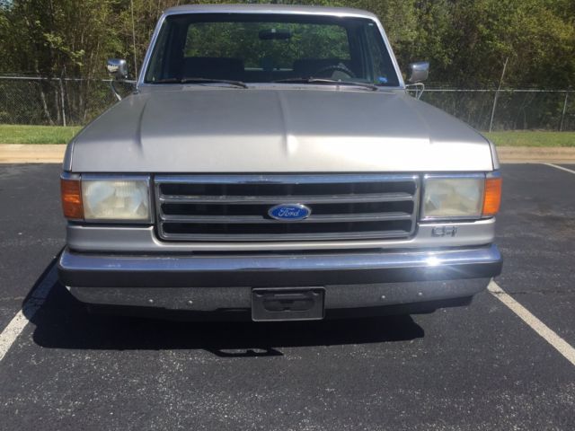 1991 silver Ford F-150 Standard Cab Pickup