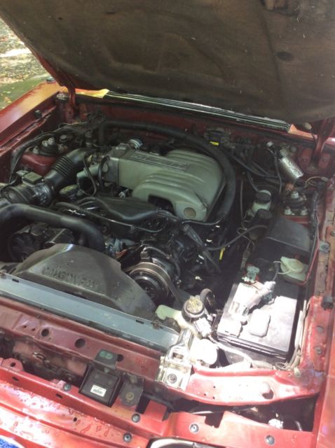1991 Red silver Ford Mustang Hatchback