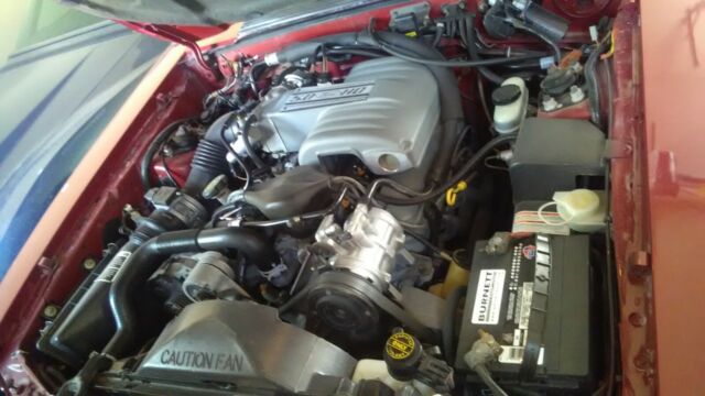 1991 Burgundy Ford Mustang Convertible