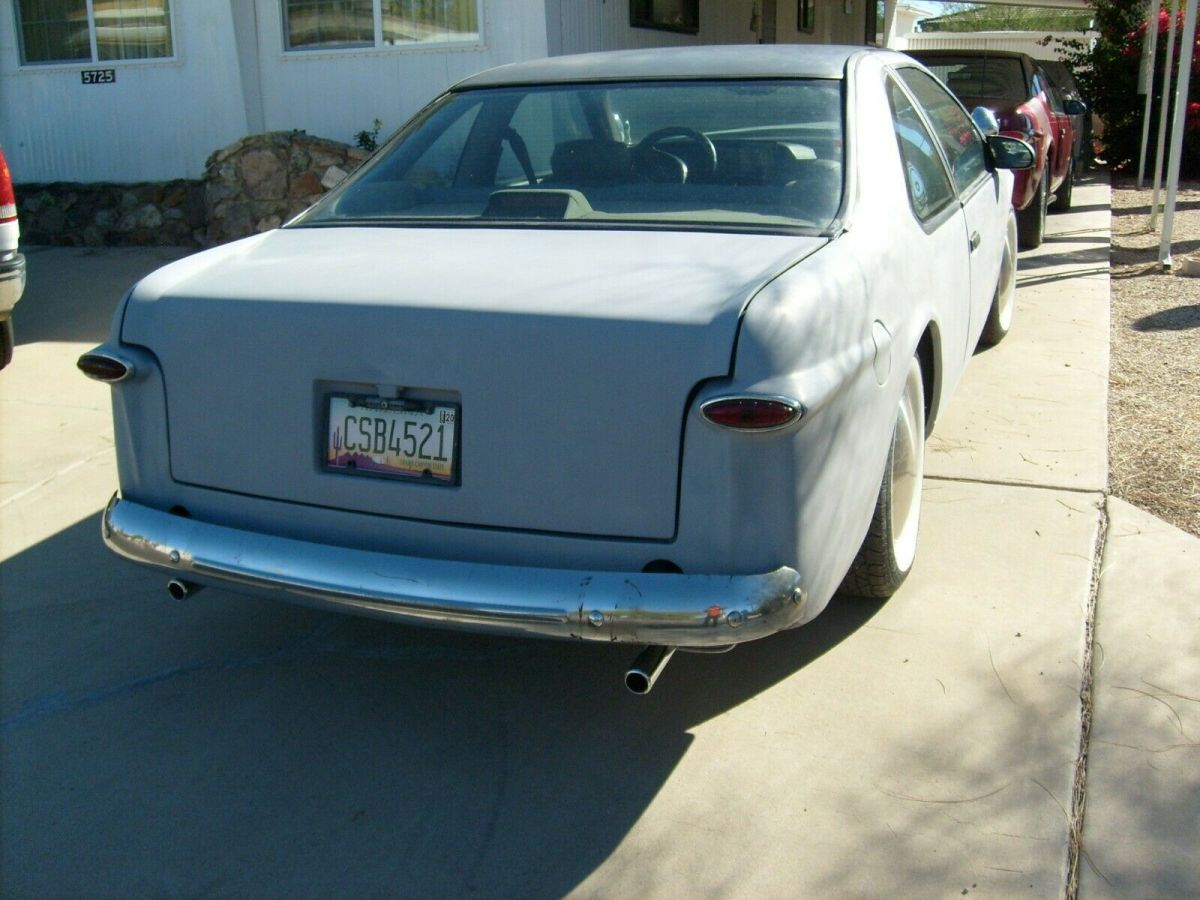 1949 Red Ford Thunderbird Coupe