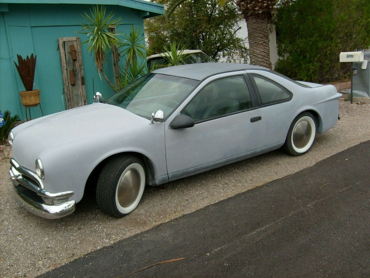 1949 Red Ford Thunderbird Coupe
