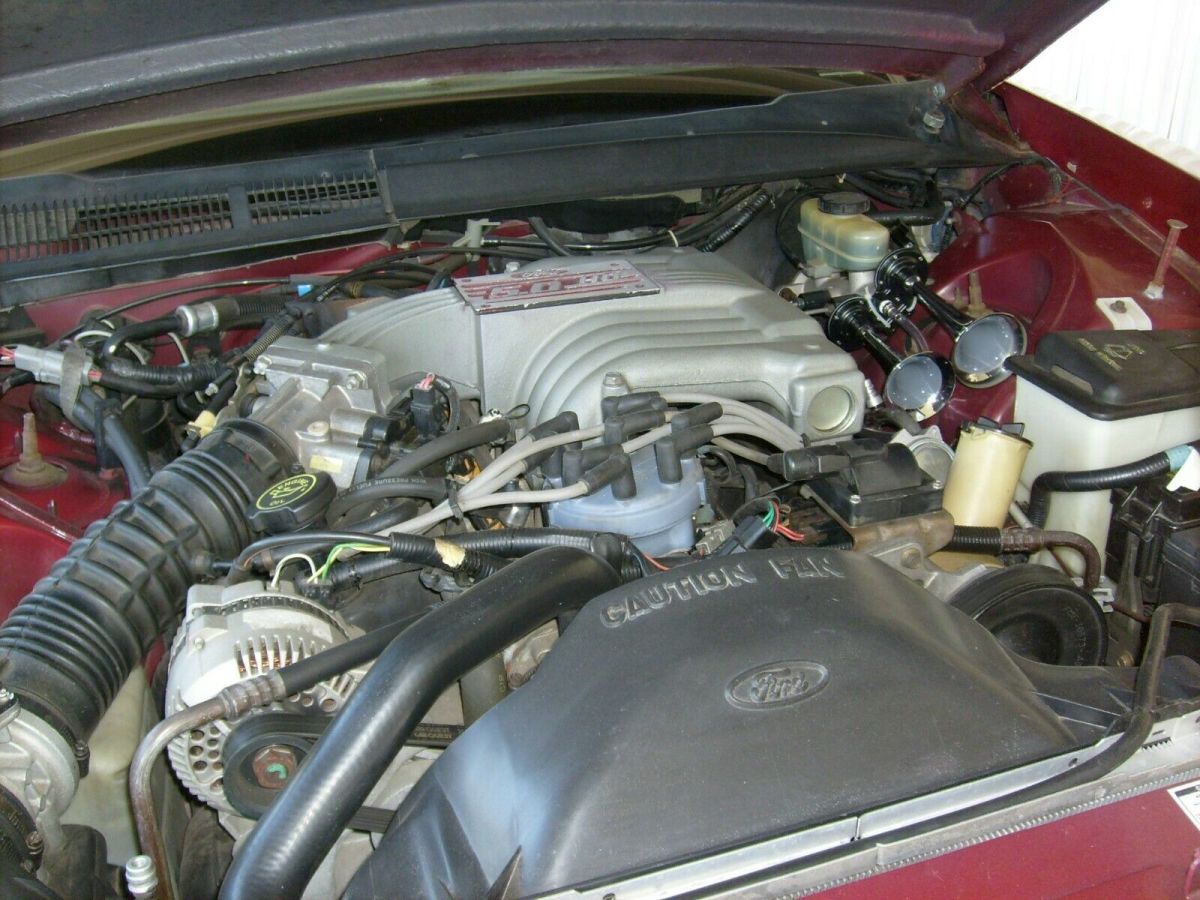 1949 Red Ford Thunderbird Coupe