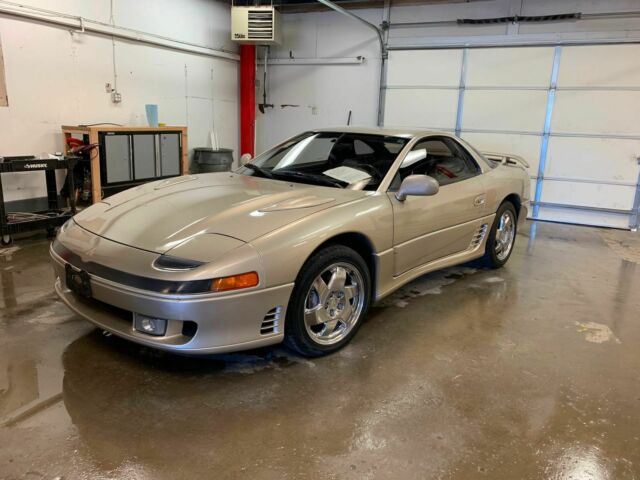 1991 Gold Mitsubishi 3000GT Coupe