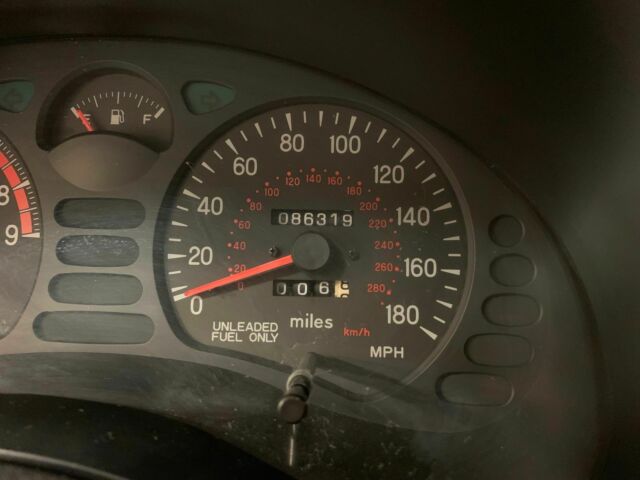 1991 Gold Mitsubishi 3000GT Coupe