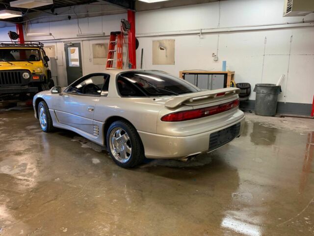1991 Gold Mitsubishi 3000GT Coupe