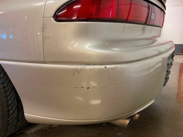 1991 Gold Mitsubishi 3000GT Coupe