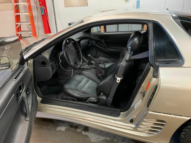 1991 Gold Mitsubishi 3000GT Coupe
