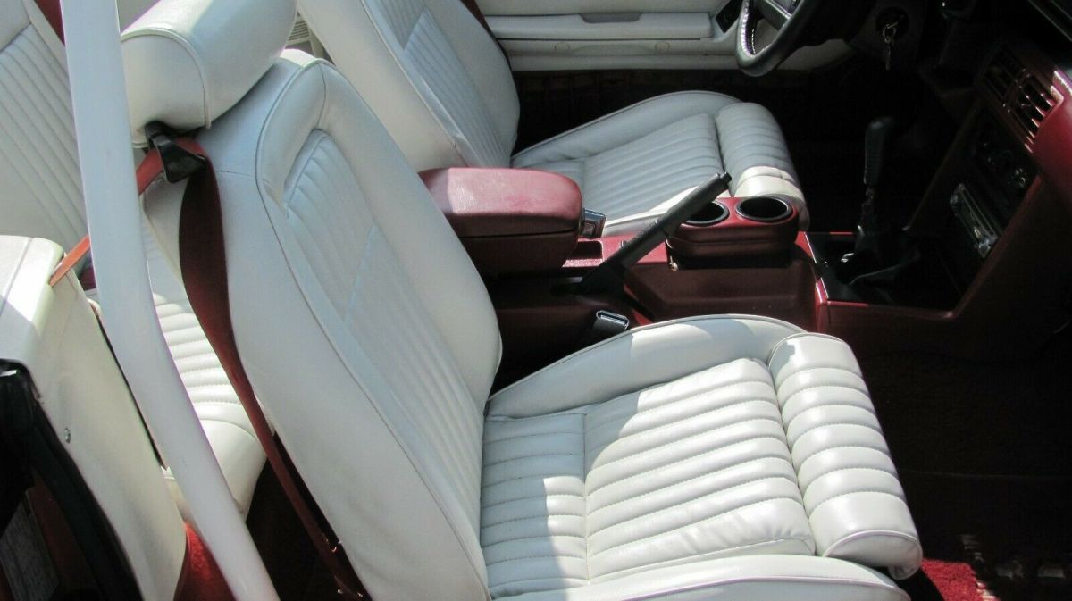 1991 Burgundy/ silver Ford Mustang Convertible