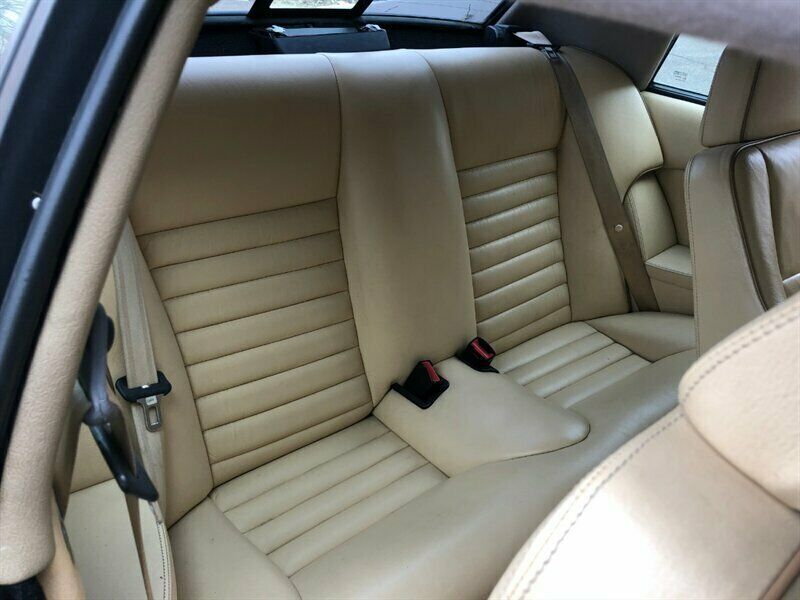 1991 Gold Jaguar XJ8 --