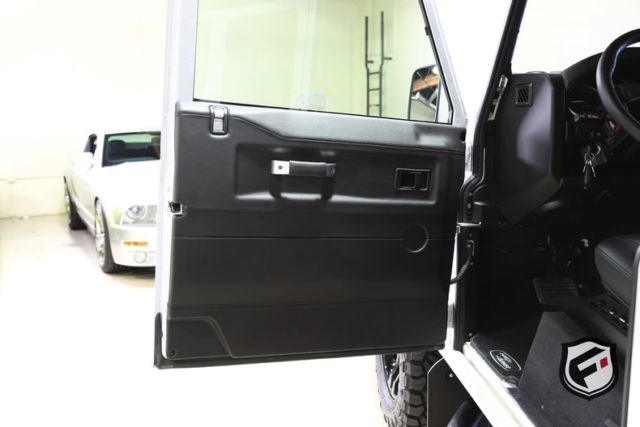 1991 White Land Rover Defender 110