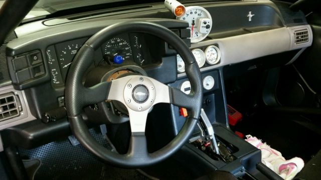 1991 grey Ford Mustang Hatchback