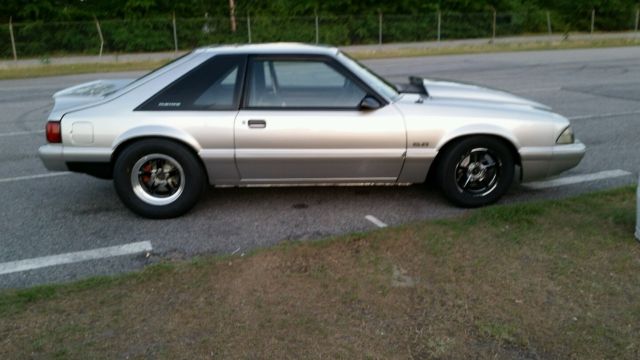1991 grey Ford Mustang Hatchback