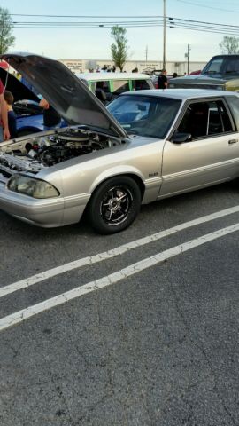 1991 grey Ford Mustang Hatchback