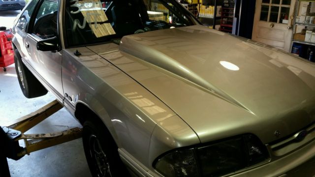 1991 grey Ford Mustang Hatchback