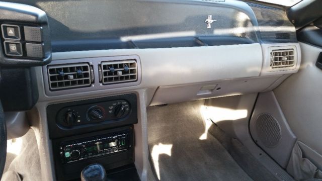1991 Dark emerald green Ford Mustang