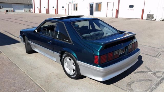 1991 Dark emerald green Ford Mustang
