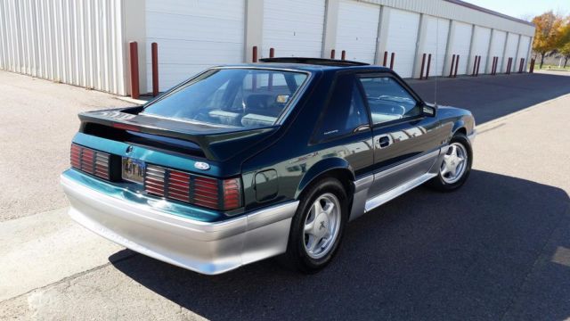 1991 Dark emerald green Ford Mustang
