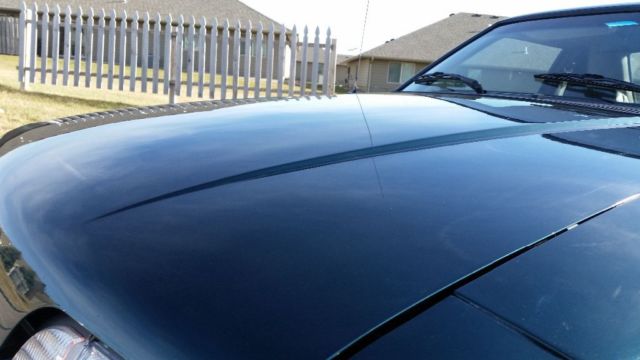 1991 Dark emerald green Ford Mustang
