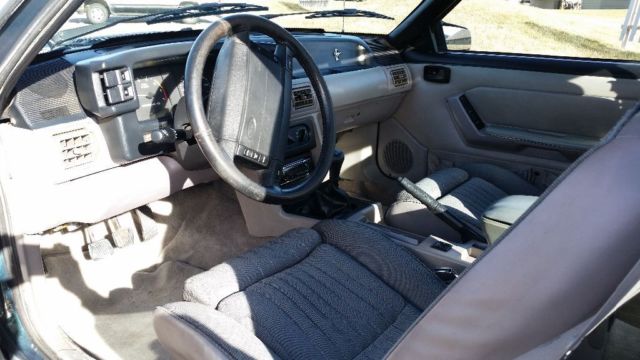 1991 Dark emerald green Ford Mustang