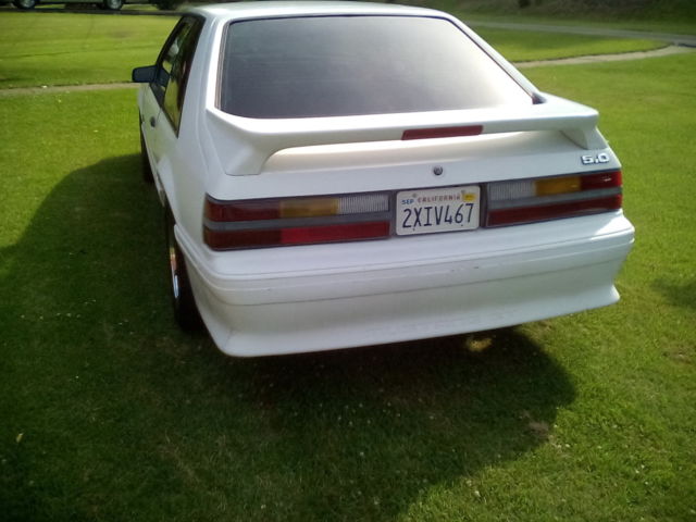1991 white Ford Mustang Hatchback