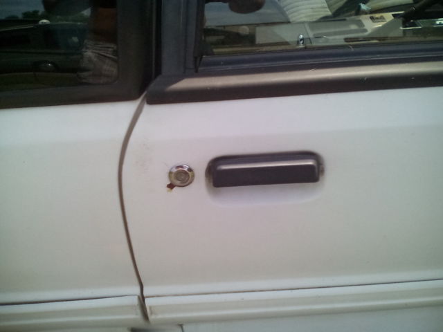 1991 white Ford Mustang Hatchback