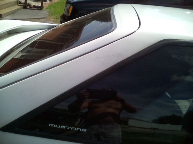 1991 white Ford Mustang Hatchback