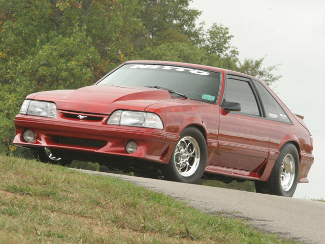 1991 Custom Wild Strawberry with Candy Orange Flames Ford Mustang Hatchback