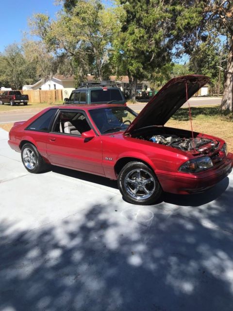 1991 Burgundy Ford Mustang Hatchback