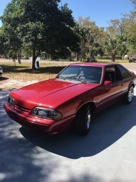1991 Burgundy Ford Mustang Hatchback