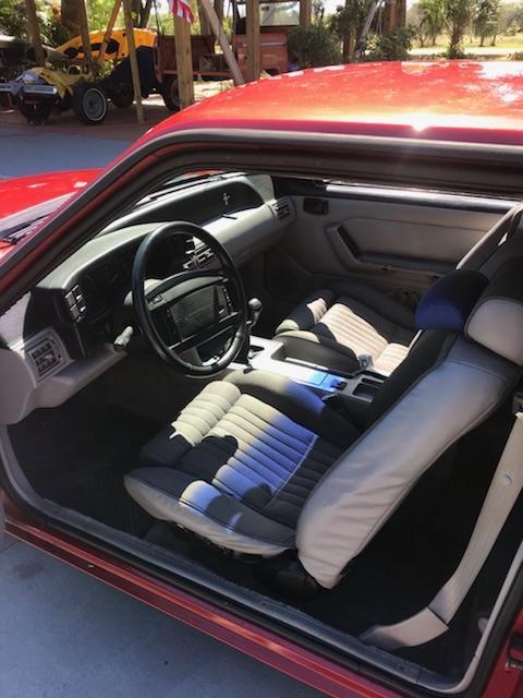 1991 Burgundy Ford Mustang Hatchback
