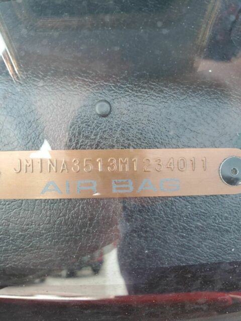 1991 Red Mazda MX-5 Miata Coupe