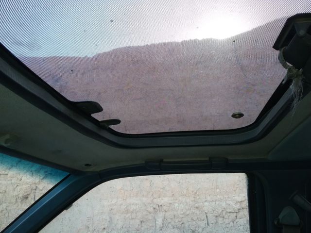 1991 blue/gray Nissan Pathfinder SUV