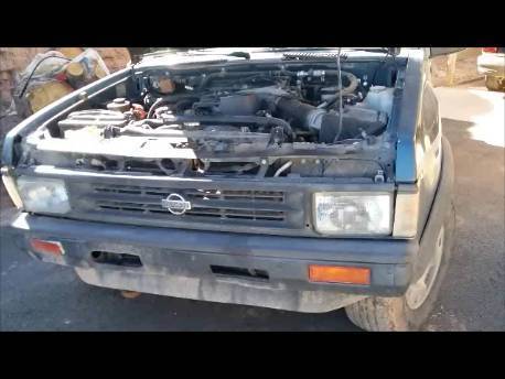 1991 blue/gray Nissan Pathfinder SUV