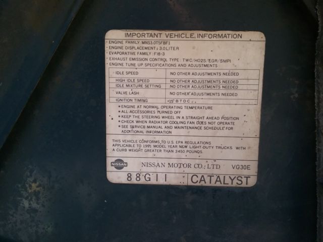 1991 blue/gray Nissan Pathfinder SUV