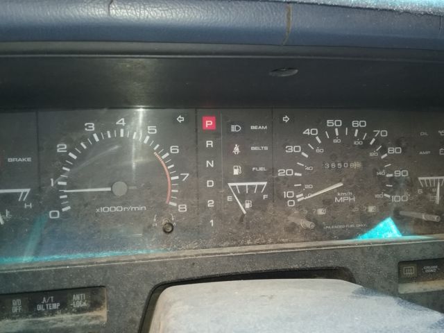 1991 blue/gray Nissan Pathfinder SUV